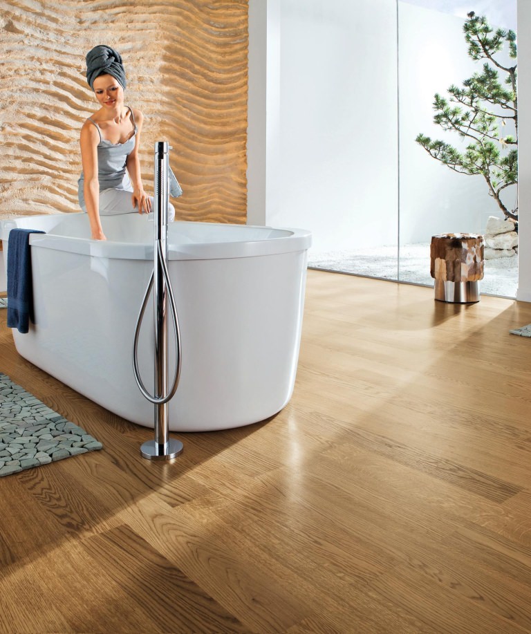 Wooden floor in bathroom with HARO Parquet Spa