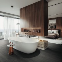 Moderne indrettet soveværelse med åbent badeværelse og mørkt HARO laminatgulv, der skaber en elegant og stilfuld atmosfære.