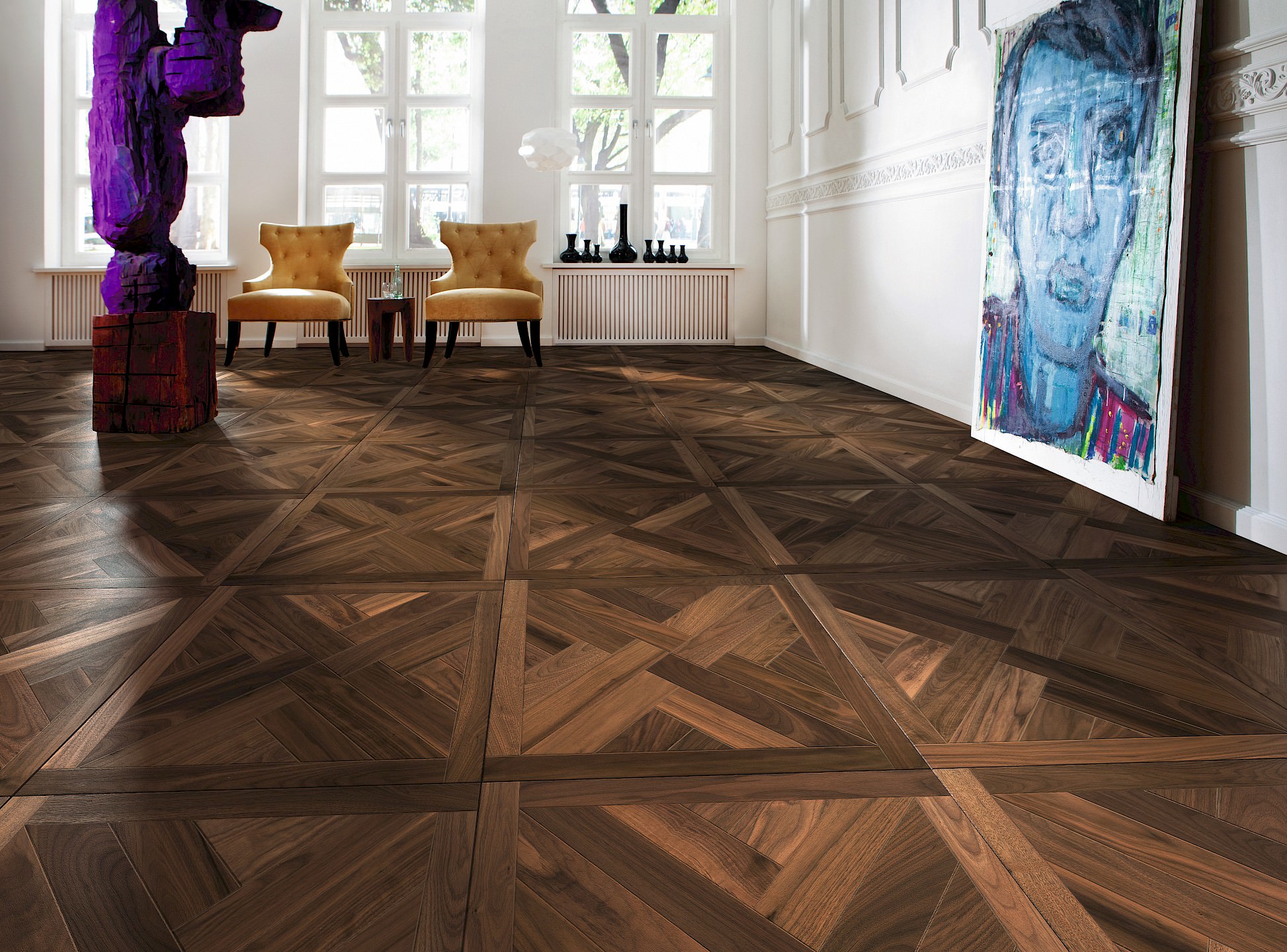 Hell eingerichtete Galerie mit edlem Tafelparkett der HARO parkettmanufaktur – klassische Eleganz trifft auf zeitgenössische Raumgestaltung.