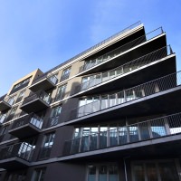 Ni huse med ni forskellige facader – boligkomplekset "nio" i Berlin imponerer fra ethvert perspektiv