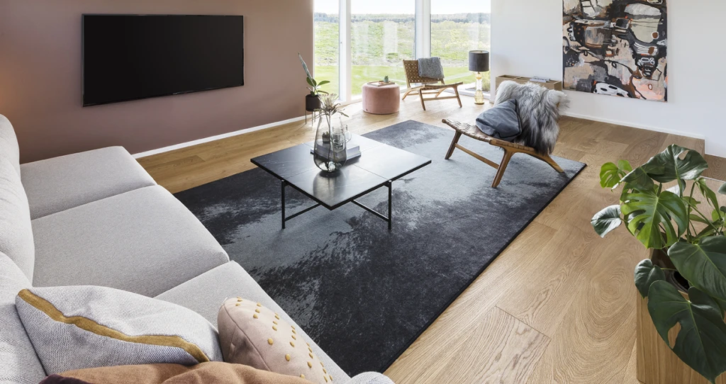 Skanlux udstillingshus ved Byg & Bo 2019 Udsigt ud over det vide, danske landskab fra den behagelige sofa – det kan man kalde nordisk livsfølelse