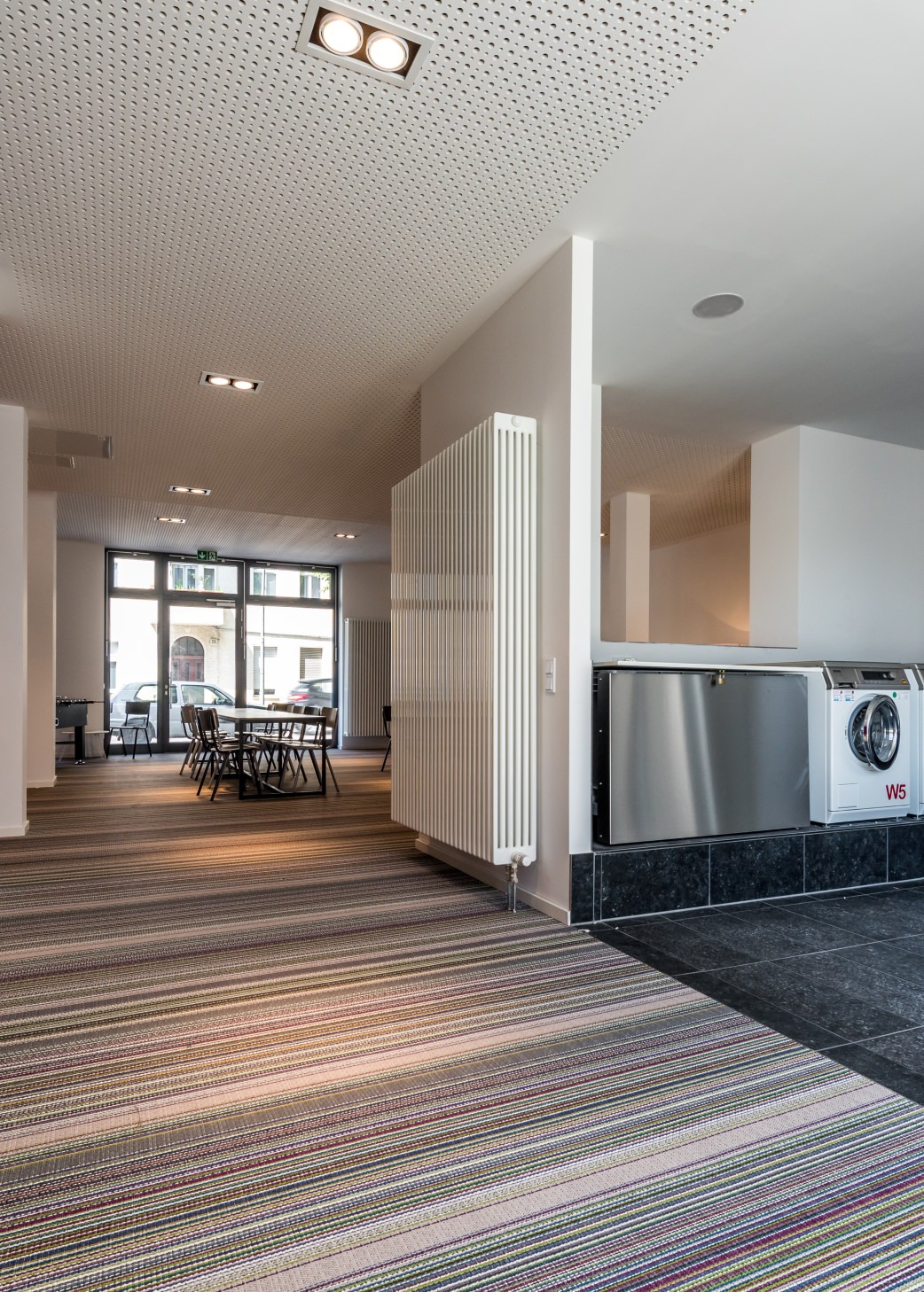 Gemeinschaftsräume und Waschsalon sind wichtige Bestandteile der Wohnanlage als Treffpunkt für die Studenten.