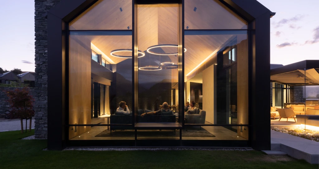 The huge glass front in the living area offers special views of this exceptional house.