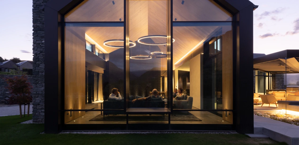 The huge glass front in the living area offers special views of this exceptional house.