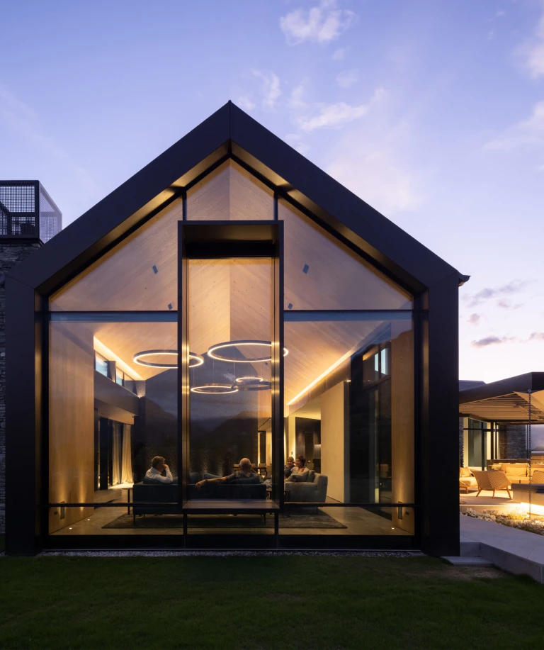 The huge glass front in the living area offers special views of this exceptional house.